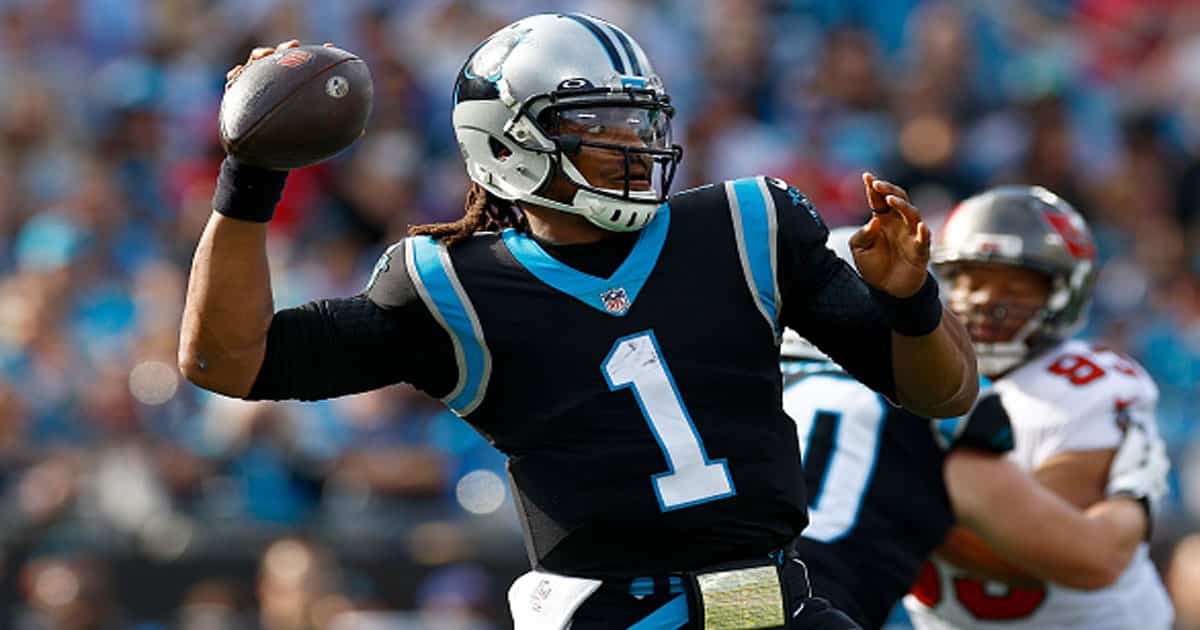 Cam Newton #1 of the Carolina Panthers drops back to pass the ball during the first quarter in the game against the Tampa Bay Buccaneers